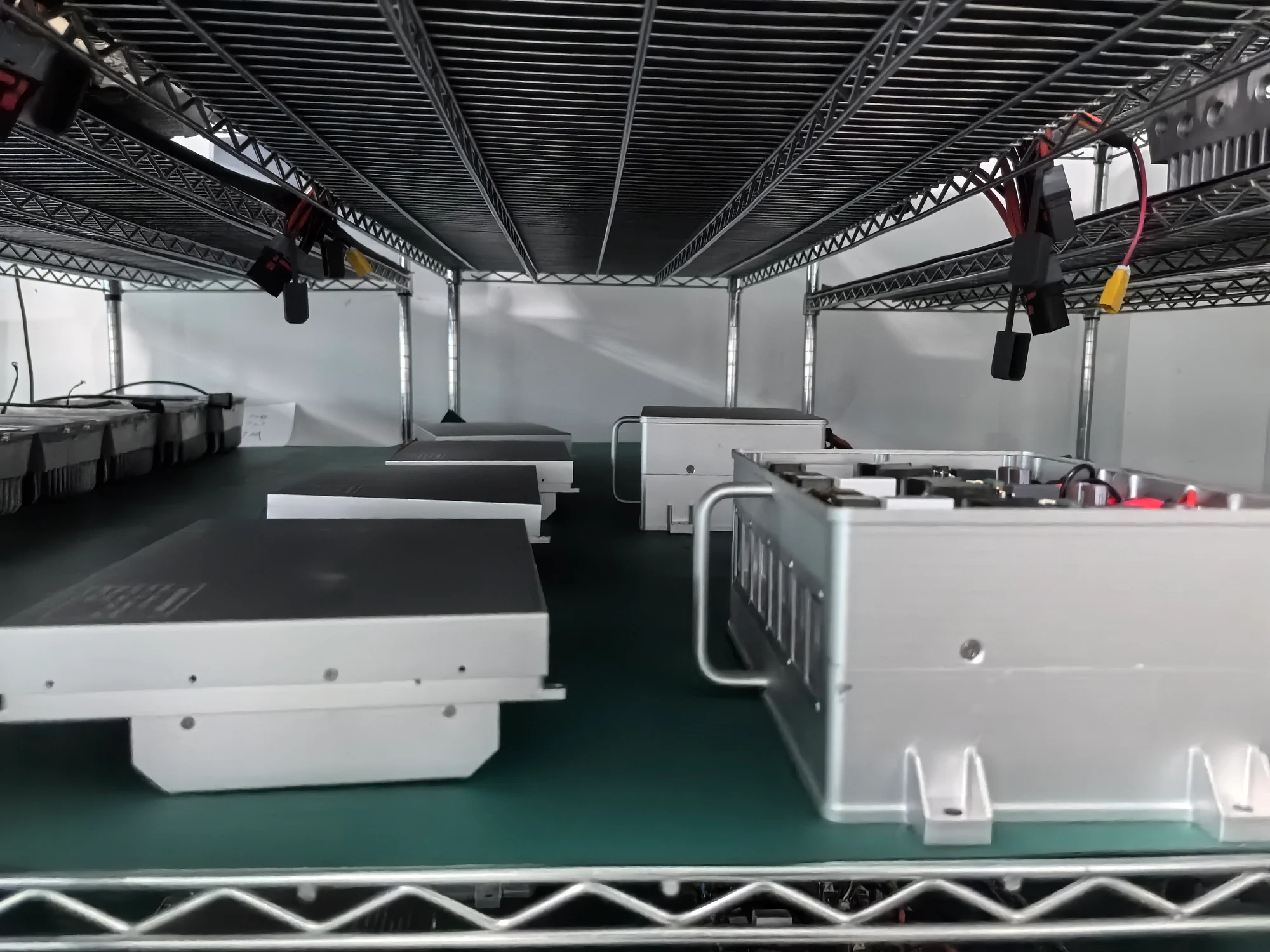 Power module housings and assemblies on factory shelves