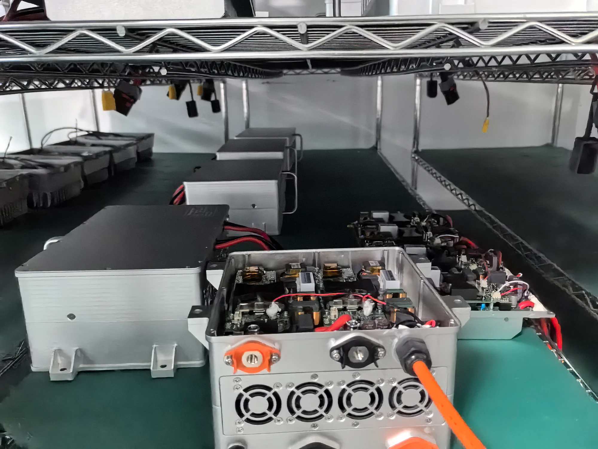 Power module housings and assemblies on factory shelves
