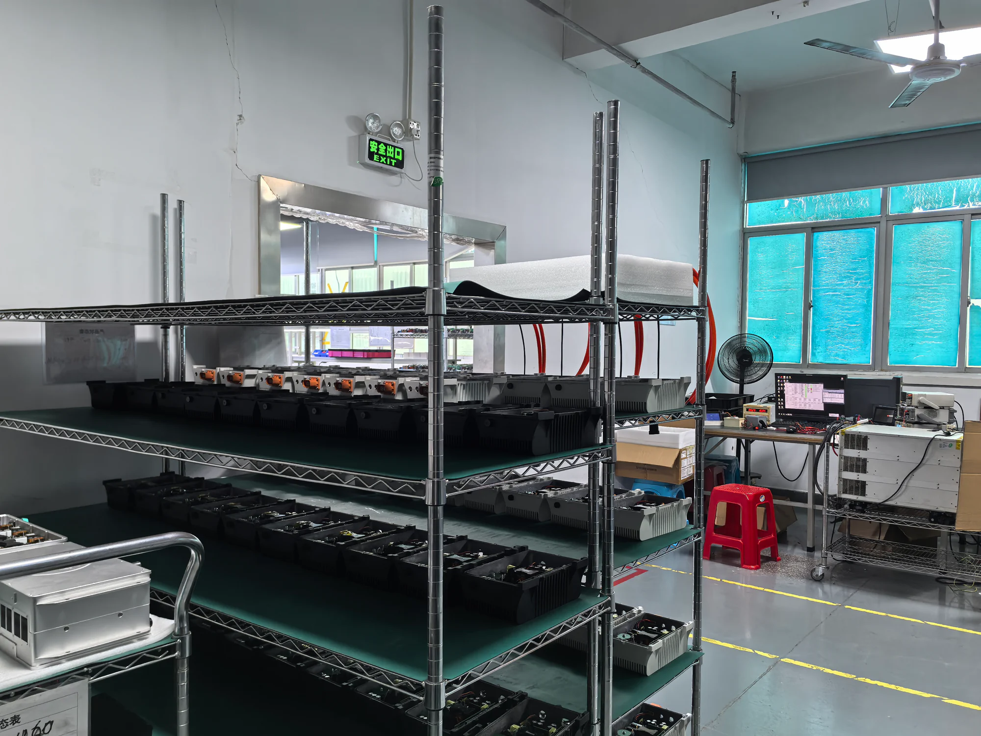 Power module housings and assemblies on factory shelves
