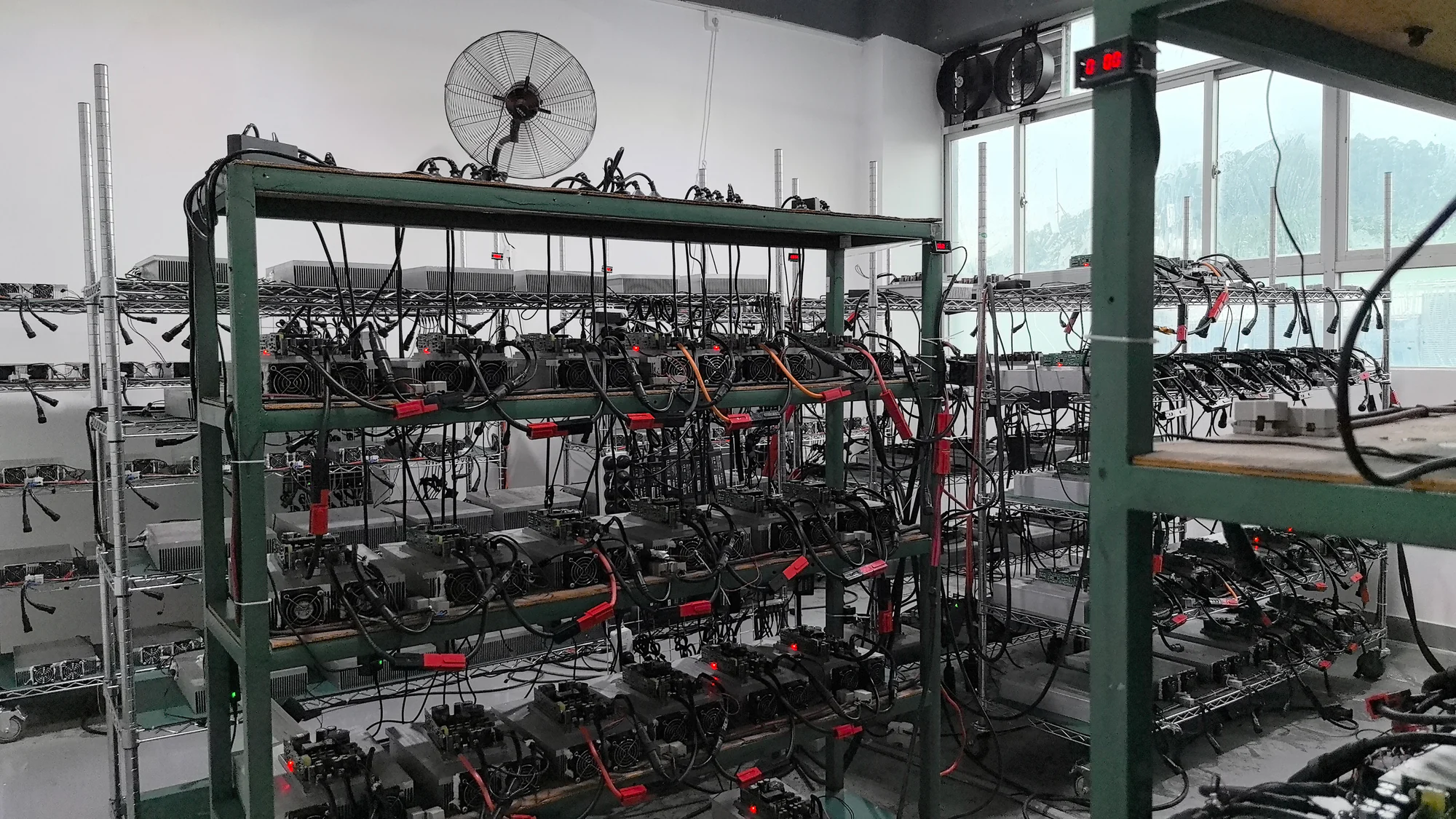 Power assemblies and connected cables on factory racks