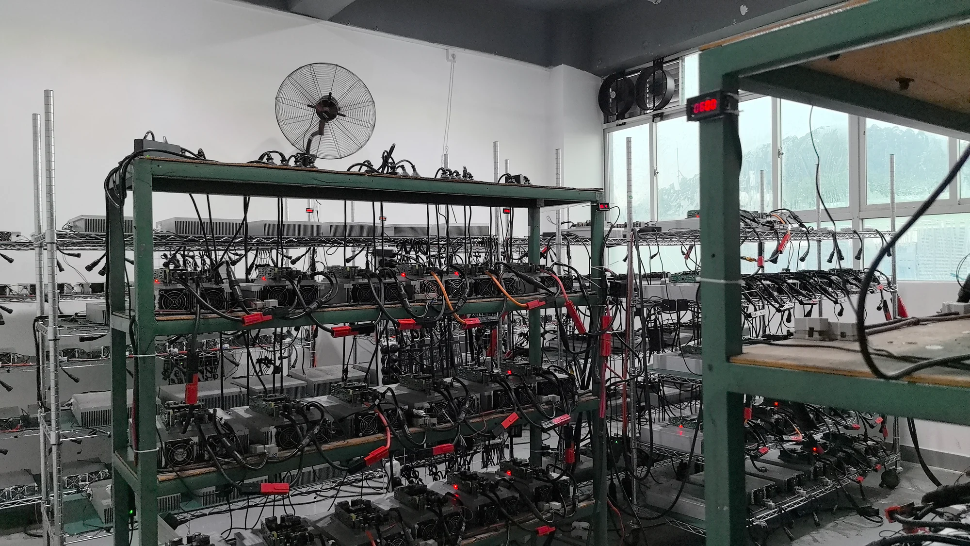 Power assemblies and connected cables on factory racks