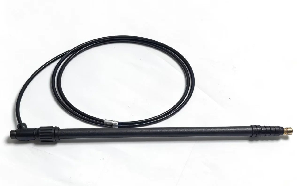 Telescopic high-pressure drone cleaning spray lance for facade washing.